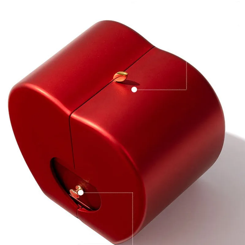 Red apple-shaped jewelry box with eternal soap flower rose and silver necklace inside