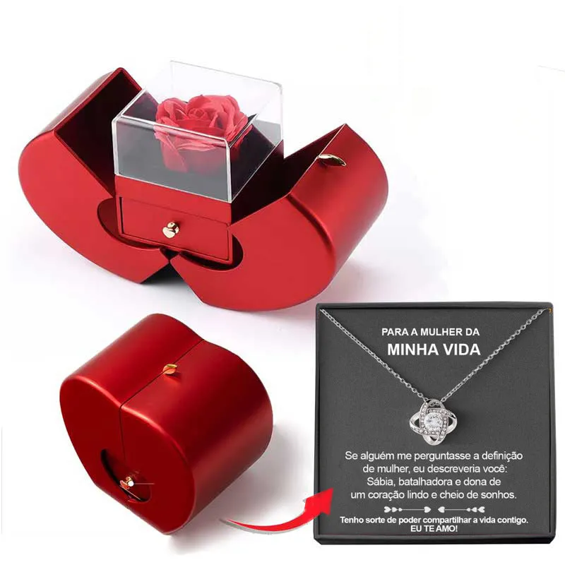 Red apple-shaped jewelry box with eternal soap flower rose and silver necklace inside