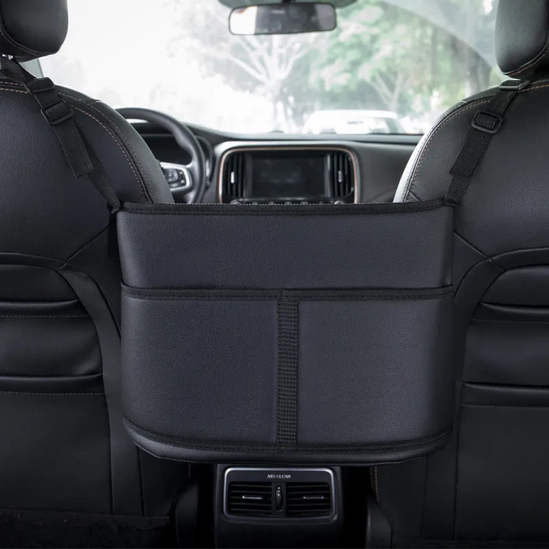 Black leather car seat storage bag with integrated hanging armrest tissue box between vehicle seats
