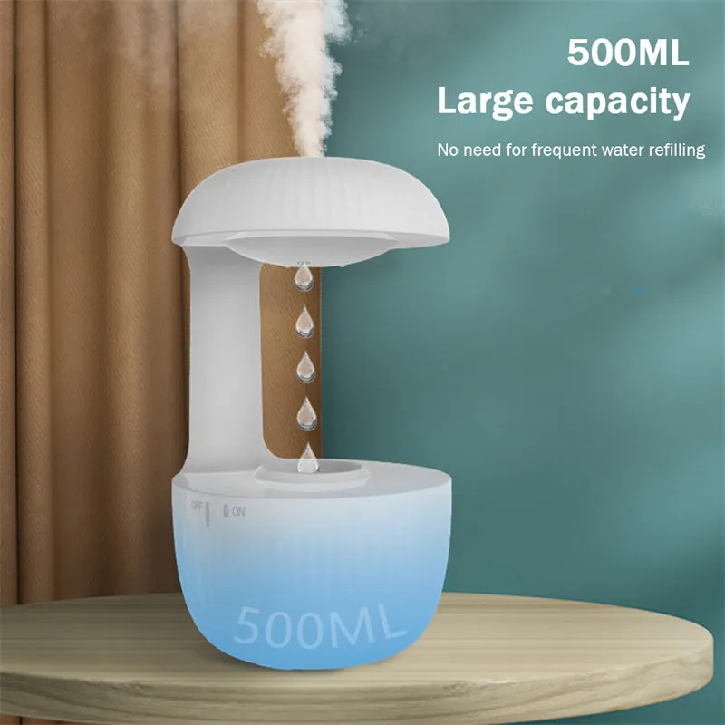 White anti-gravity air humidifier with ultrasonic mist levitating water drops on a desk