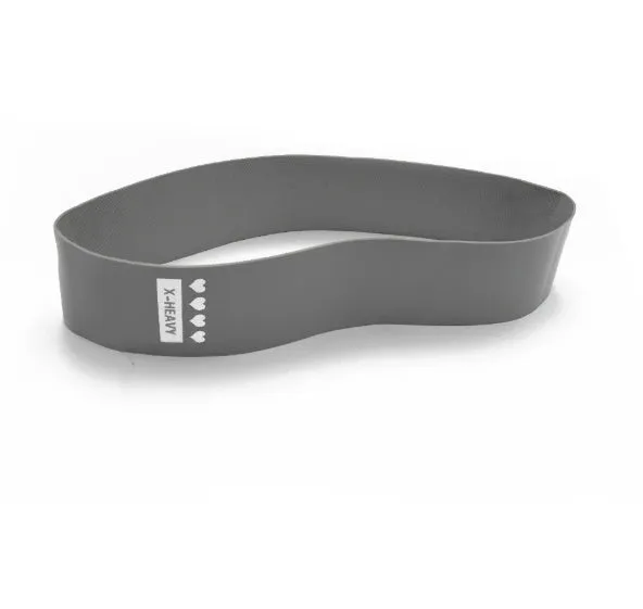 Four colour-coded resistance bands in purple, pink, blue, and grey with non-slip inner lines laid flat on a surface