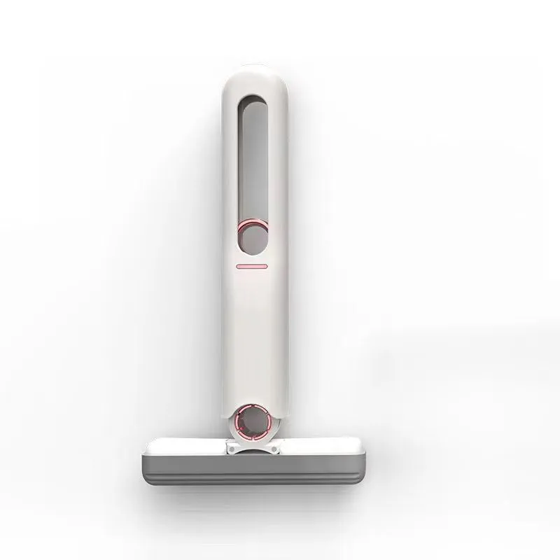 New Portable Self-Squeeze Mini Mop with hand-free wringer and biodegradable sponge on a kitchen counter