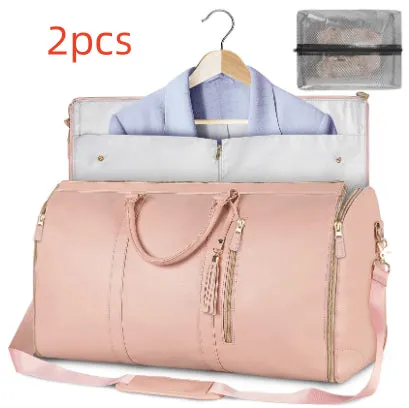 Large capacity waterproof travel duffle bag for women in pink, foldable PU material with contrast stitching and lock detail