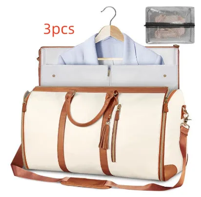 Large capacity waterproof travel duffle bag for women in pink, foldable PU material with contrast stitching and lock detail