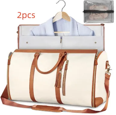 Large capacity waterproof travel duffle bag for women in pink, foldable PU material with contrast stitching and lock detail