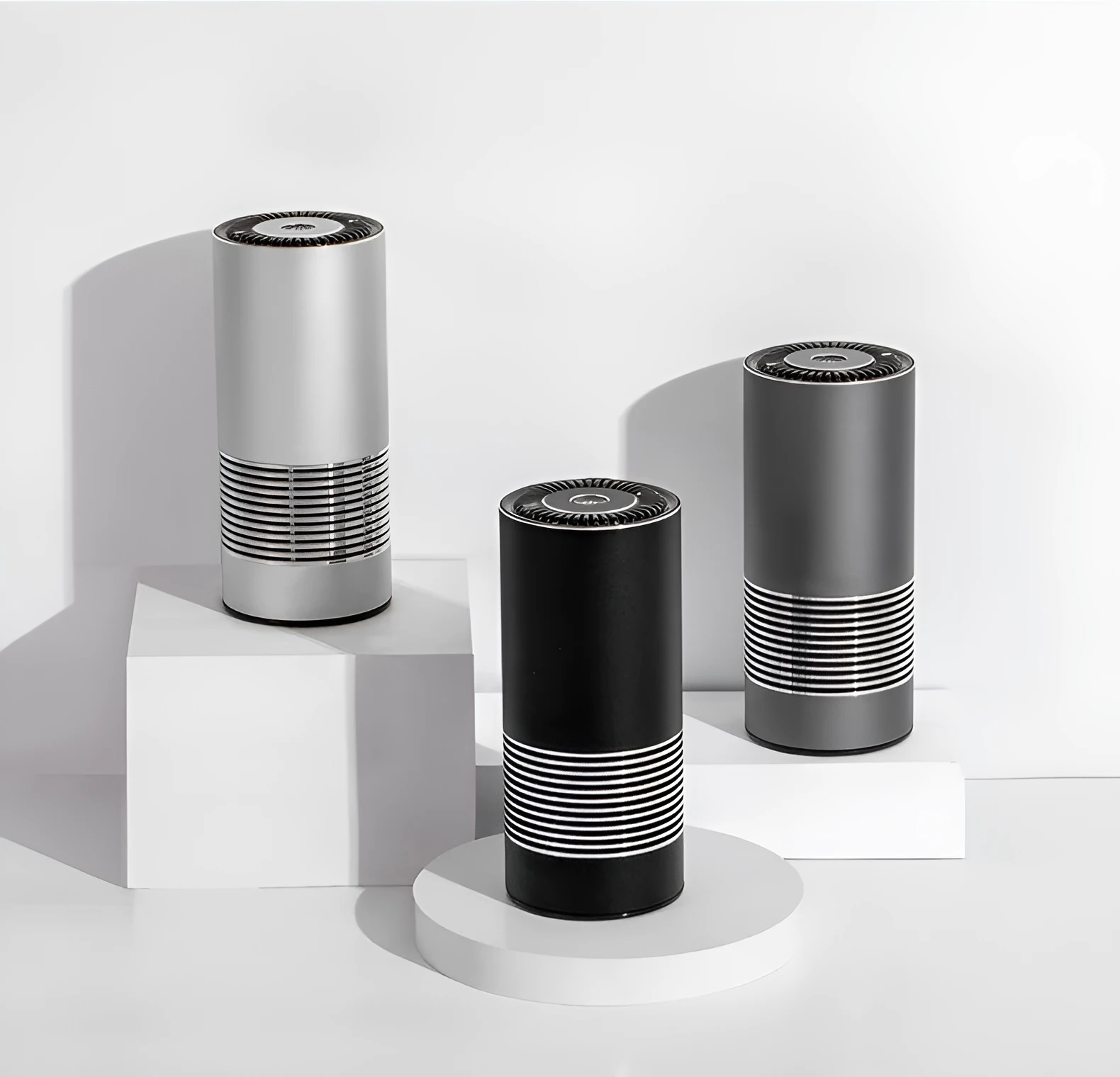 Compact aluminium alloy car wireless air purifier in black, silver, or metallic grey measuring 65mm by 150mm