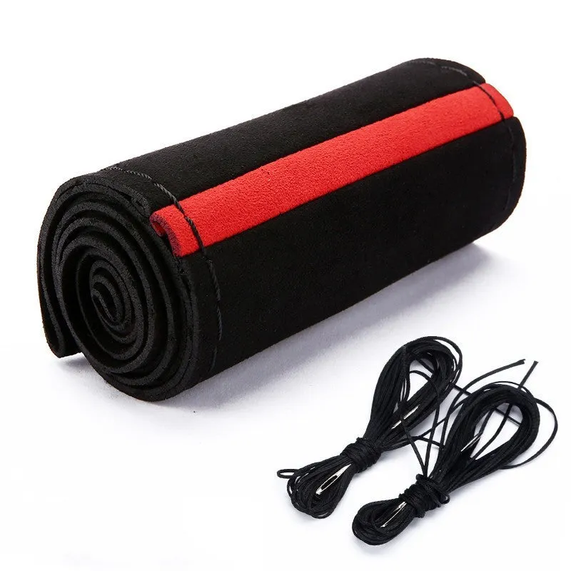 Black microfiber steering wheel cover with contrasting red stitch on 38cm diameter wheel