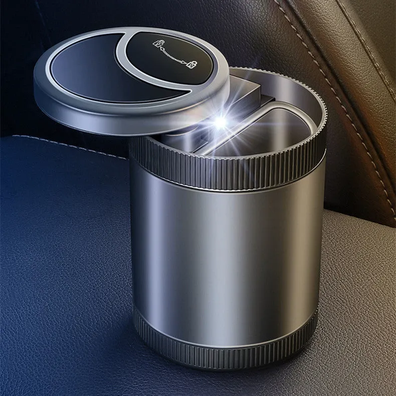 Automatic sensing vehicle ashtray with USB port in grey, black, red, or blue.