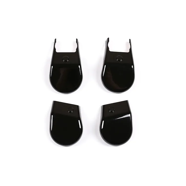 Black plastic seat feet screw decoration covers for 15-21 Toyota Hi Lux, 4 piece set on a white background