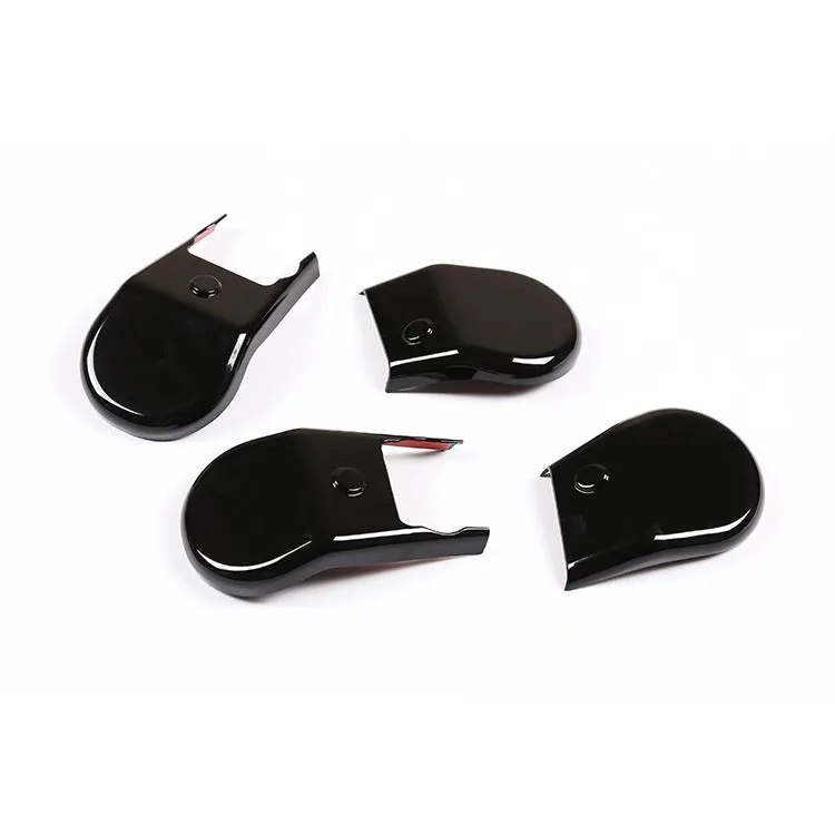 Black plastic seat feet screw decoration covers for 15-21 Toyota Hi Lux, 4 piece set on a white background