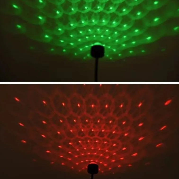Black USB car atmosphere projection star light with ABS plastic housing plugging into vehicle dashboard