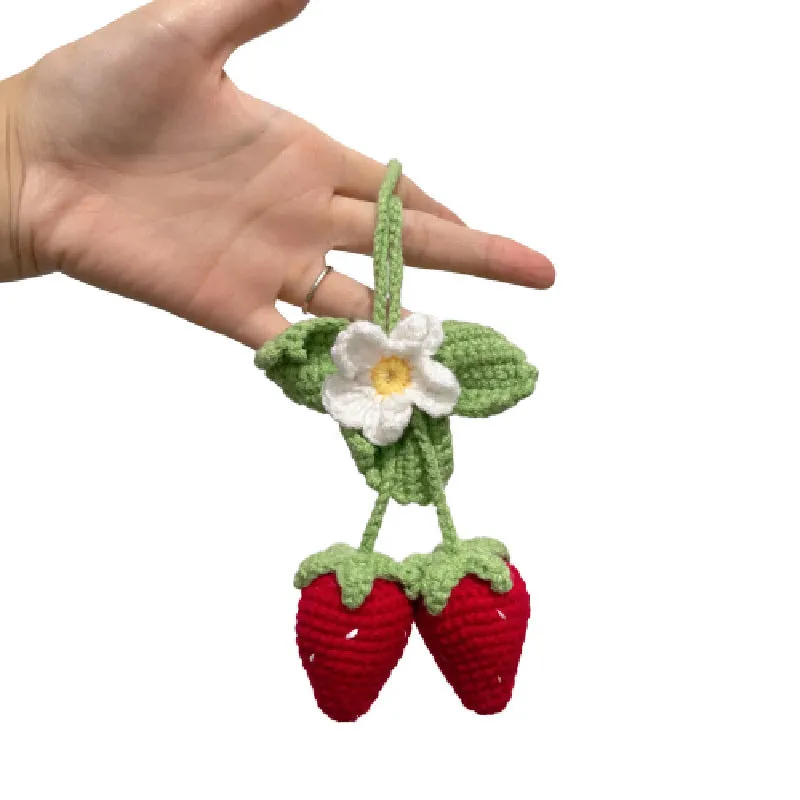 Handmade strawberry-shaped car pendant made with knitted cotton and hemp wool.