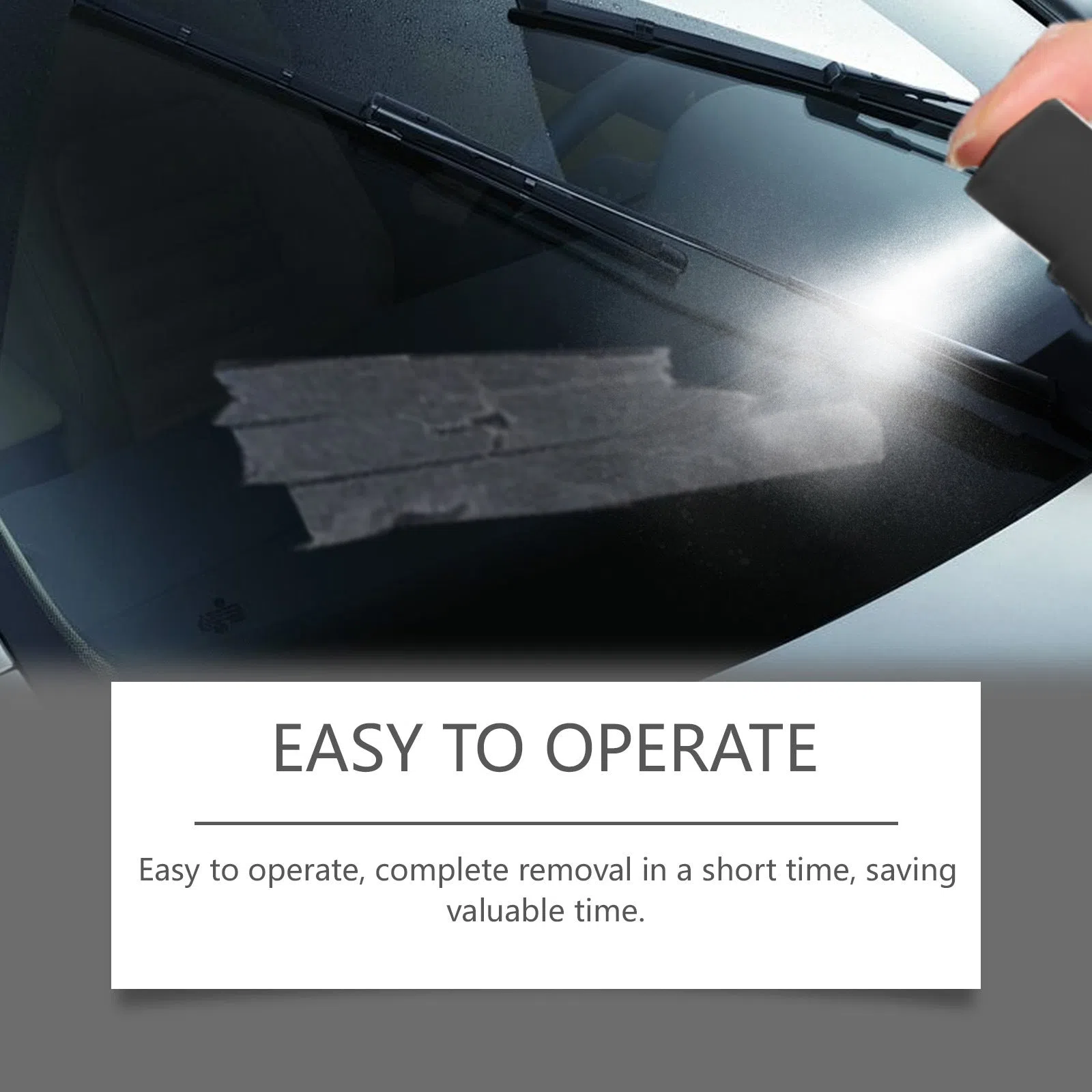Automobile sticker remover set with 100ml bottle and square towel on car windscreen