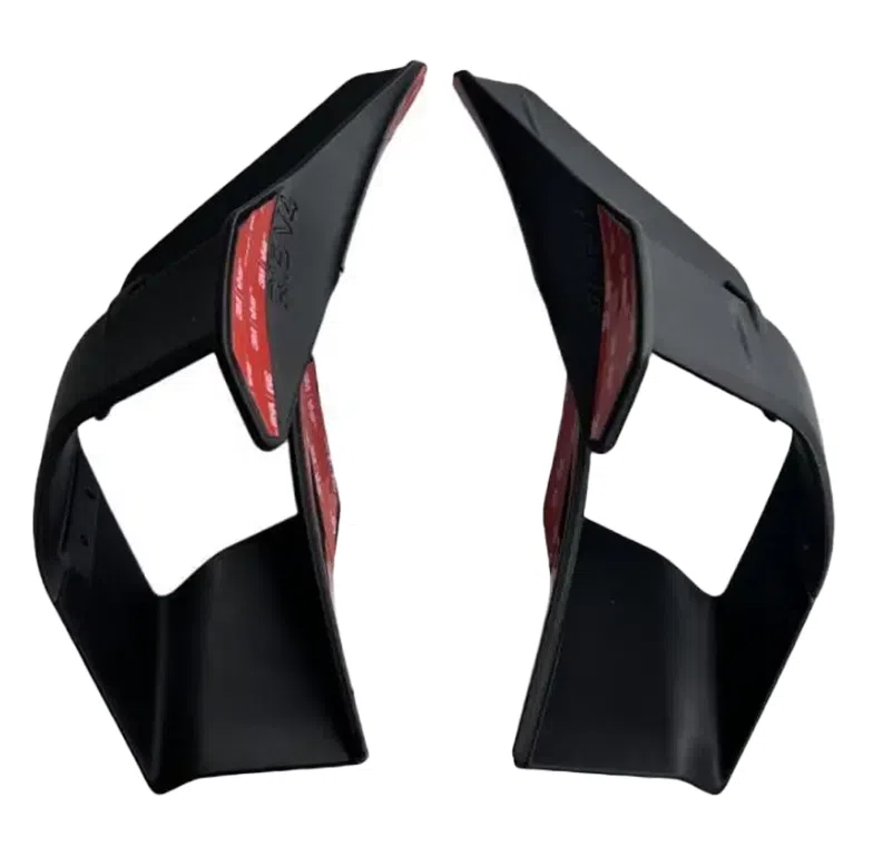 Motorcycle bodywork side wing spoiler in matte black finish on a motorcycle rear fairing