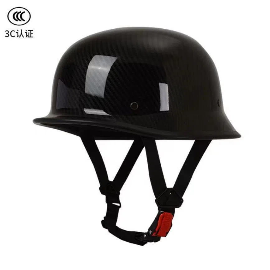 Men's retro motorcycle helmet in matte black ABS construction, side view on white background
