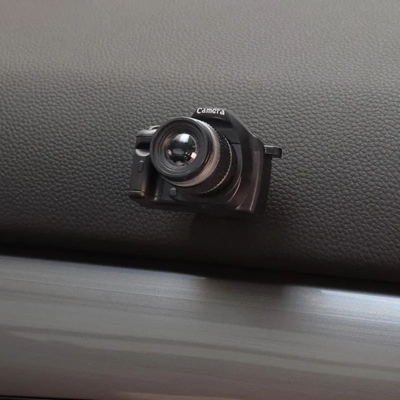 Four retro camera dot design adhesive hooks for car interior organisation measuring 4.2x2.5cm