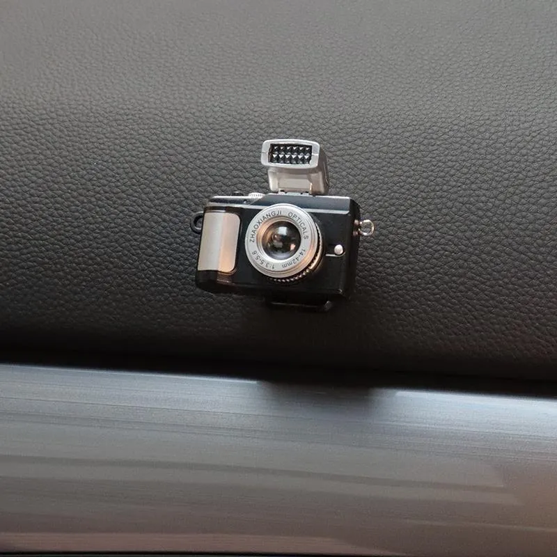 Four retro camera dot design adhesive hooks for car interior organisation measuring 4.2x2.5cm