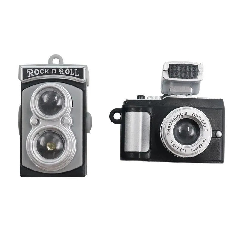 Four retro camera dot design adhesive hooks for car interior organisation measuring 4.2x2.5cm