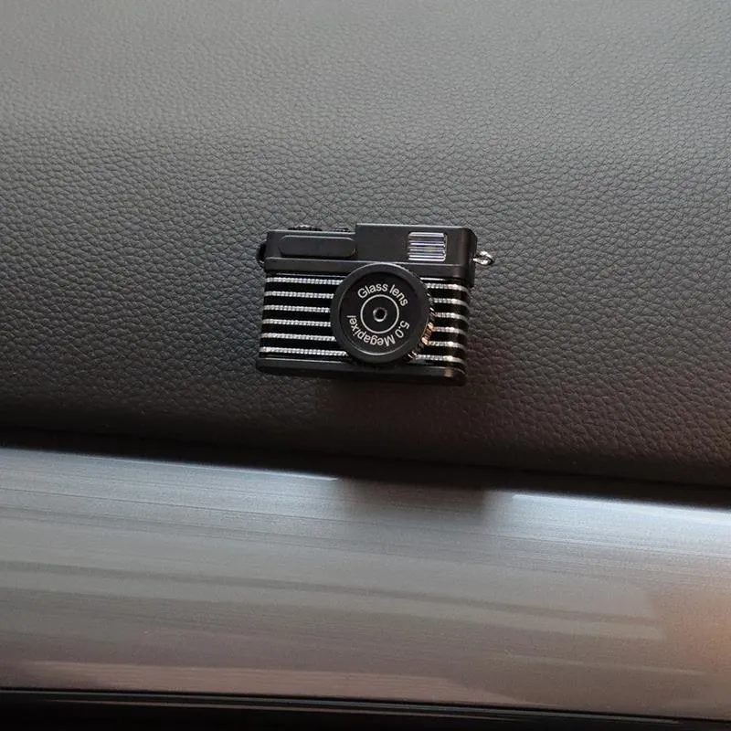 Four retro camera dot design adhesive hooks for car interior organisation measuring 4.2x2.5cm