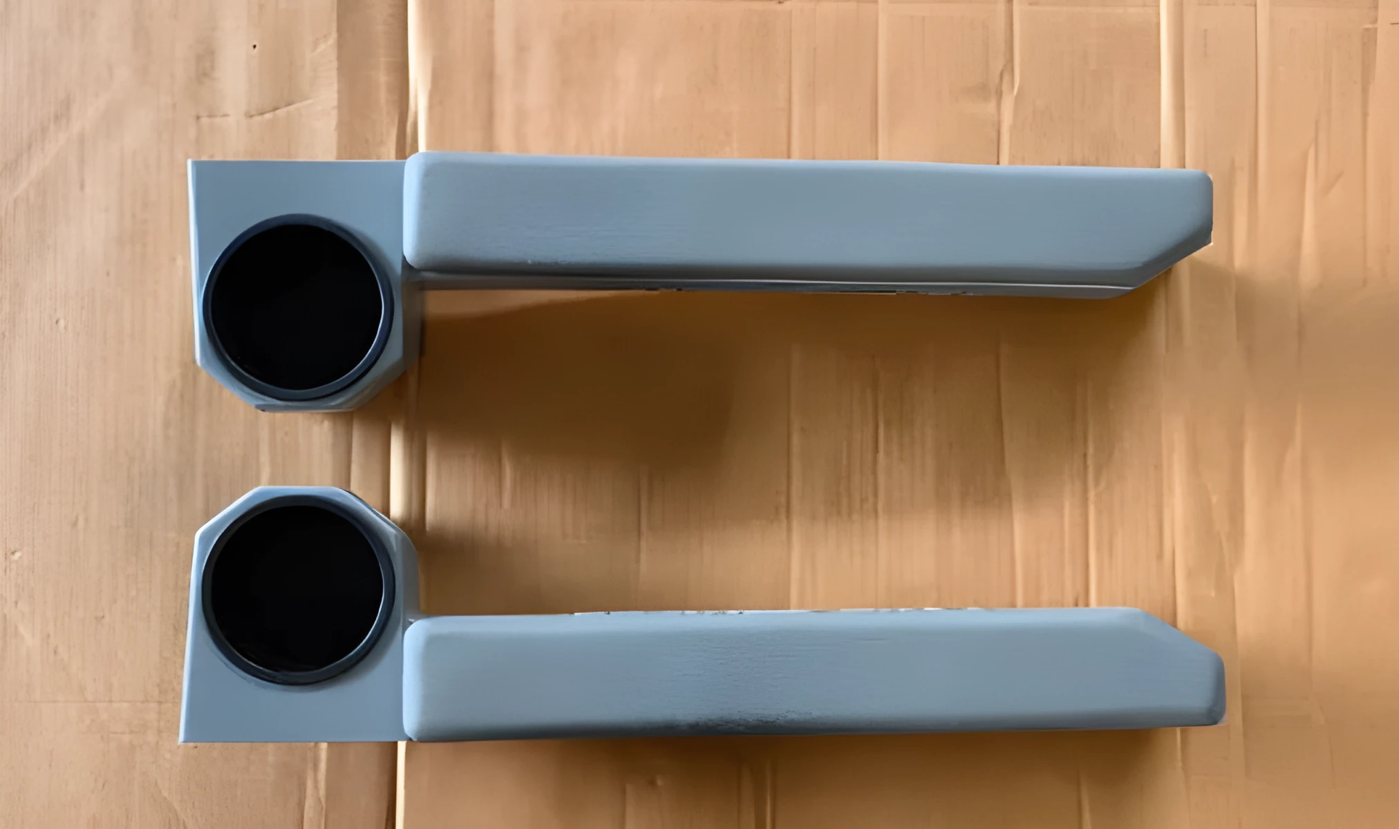 Grey magnetic car armrest door ring frame set showing two pieces for vehicle installation