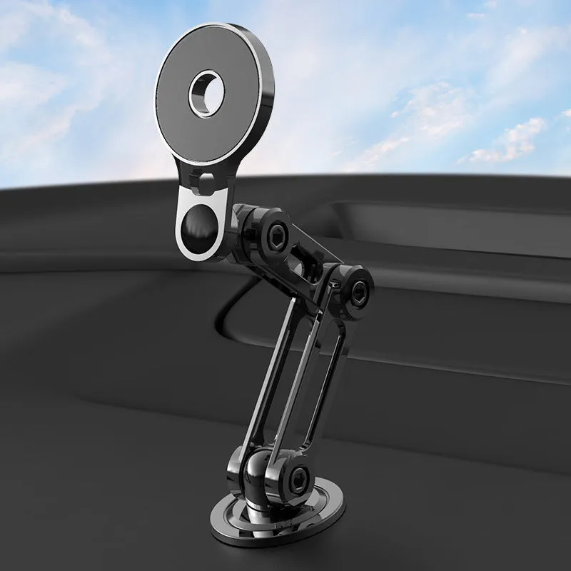 Black magnetic car phone holder mounted on dashboard with phone attached