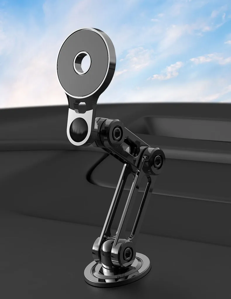 Black magnetic car phone holder mounted on dashboard with phone attached