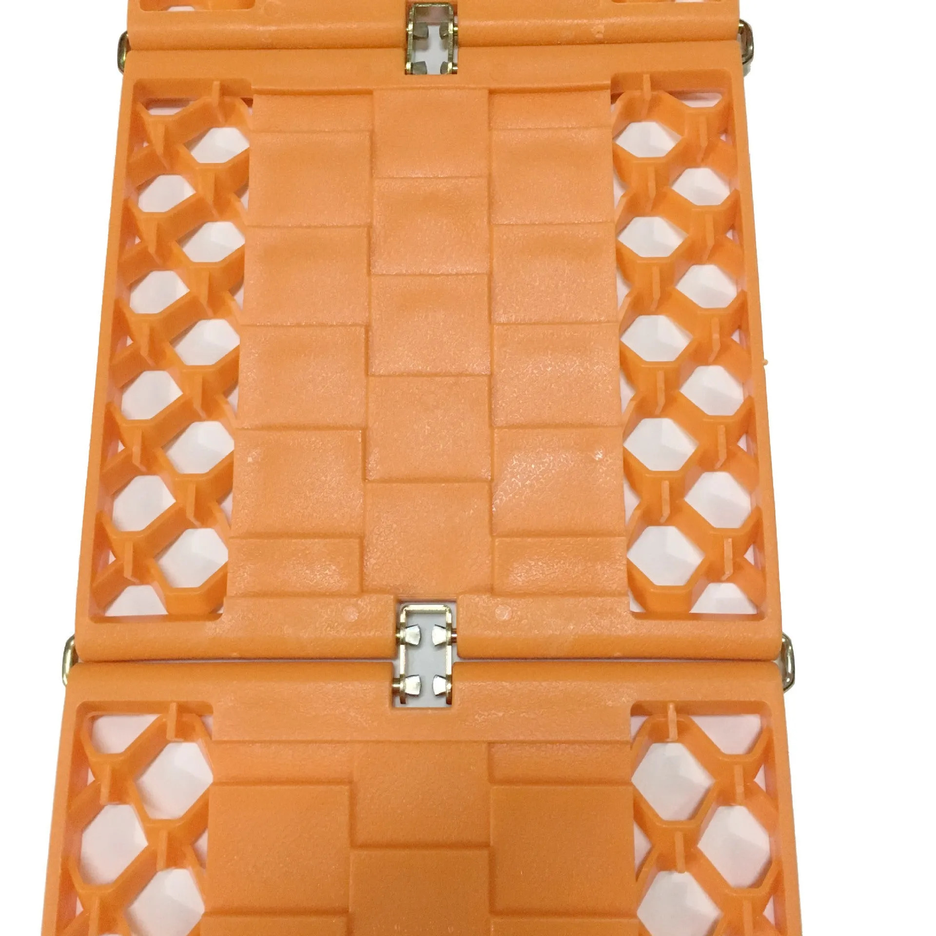 Orange folding vehicle rescue board showing rubber grip surface and folded size