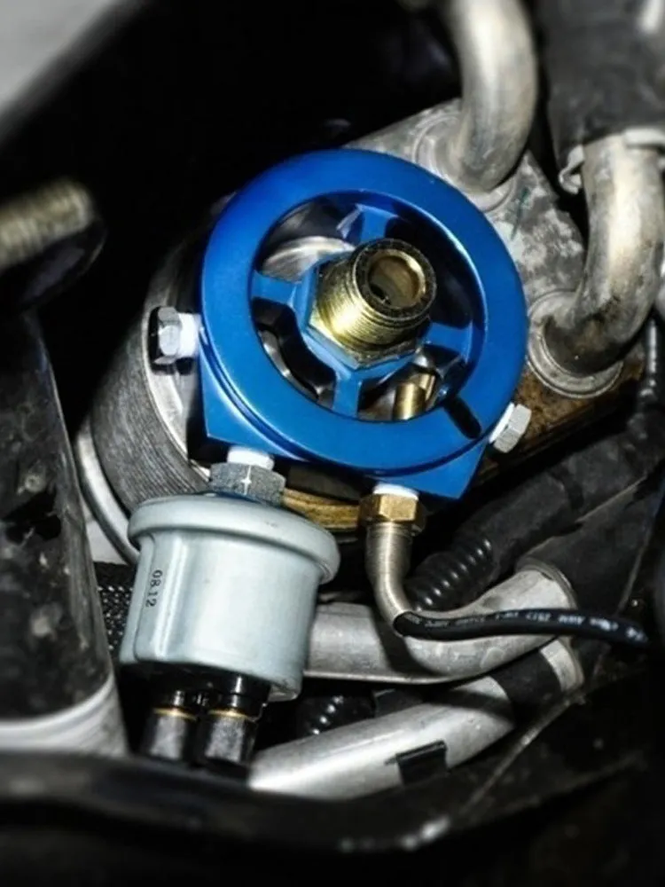 Universal aluminium alloy oil pressure gauge adapter shown in red, blue, black, gold, and silver colour options