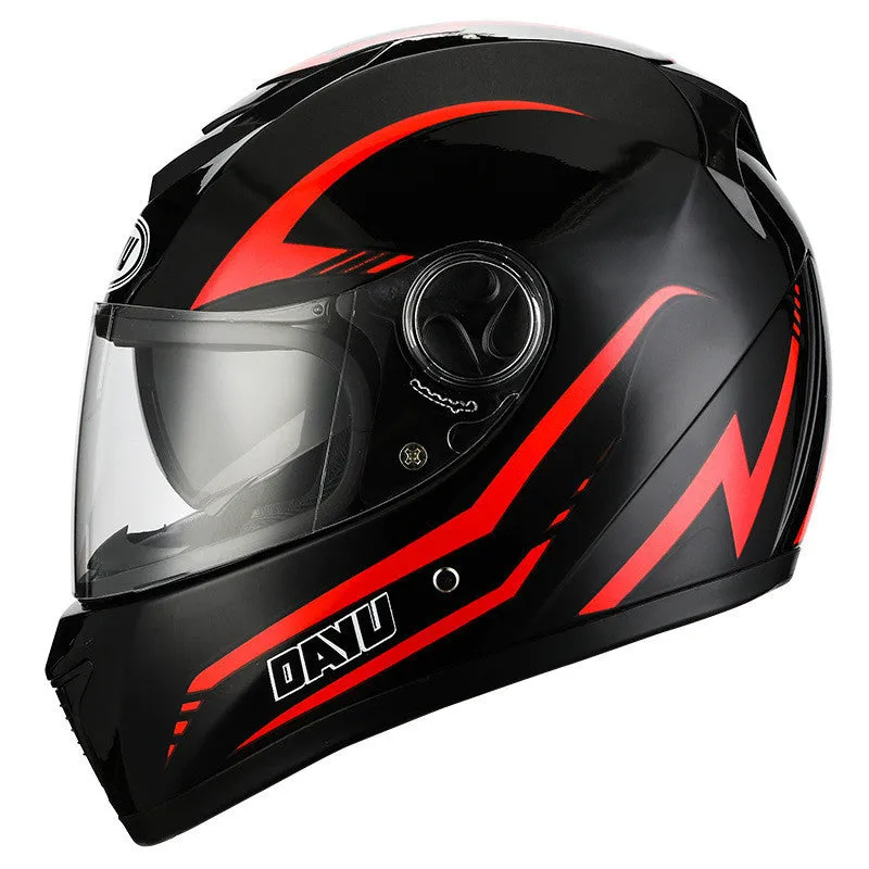 Black and red patterned motorcycle helmet with dual lens safety system
