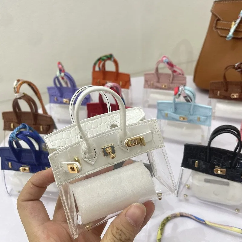 Women's artificial leather car key case showing luxury pattern designs in multiple colour options