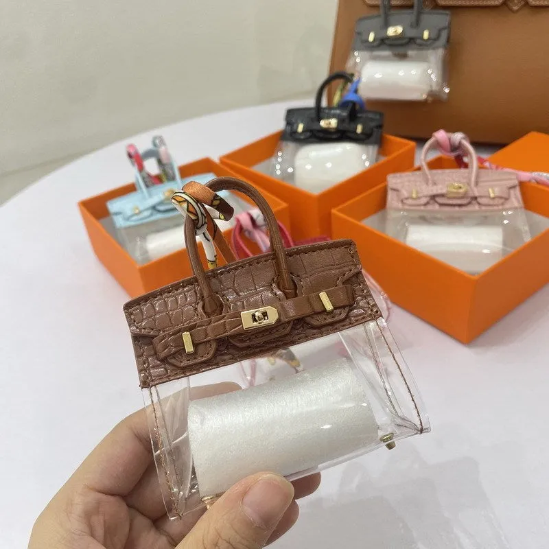 Women's artificial leather car key case showing luxury pattern designs in multiple colour options