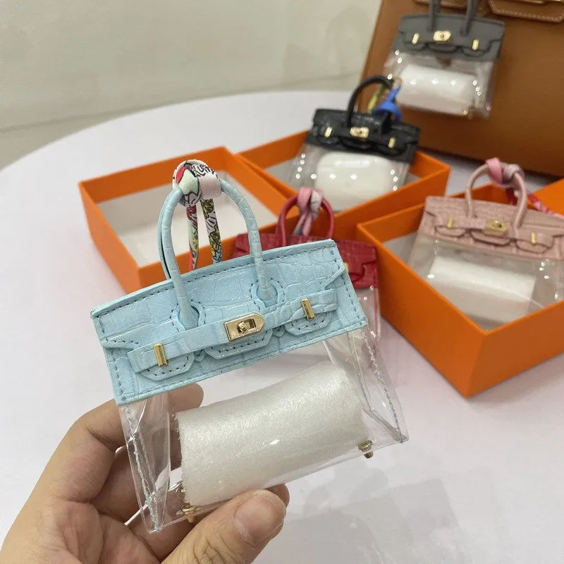 Women's artificial leather car key case showing luxury pattern designs in multiple colour options