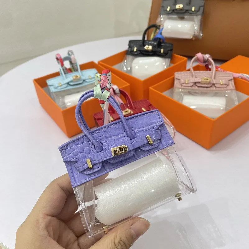 Women's artificial leather car key case showing luxury pattern designs in multiple colour options