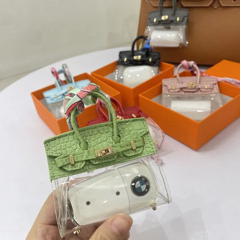 Women's artificial leather car key case showing luxury pattern designs in multiple colour options