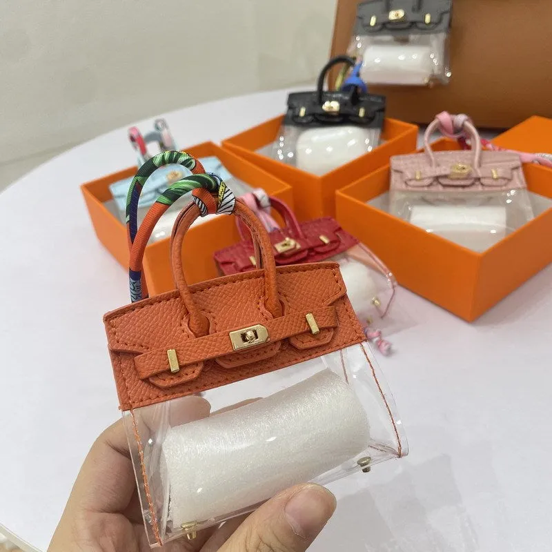 Women's artificial leather car key case showing luxury pattern designs in multiple colour options
