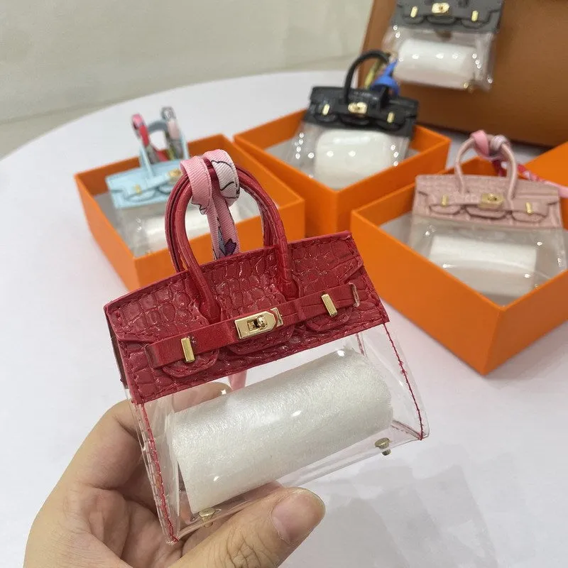 Women's artificial leather car key case showing luxury pattern designs in multiple colour options