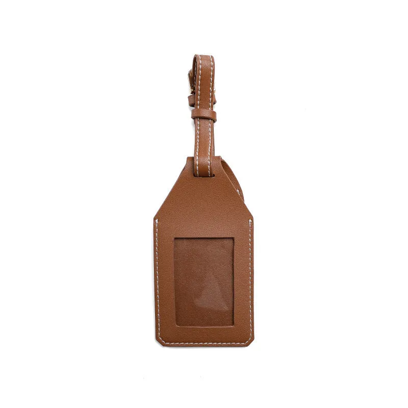 Black, brown, and orange PU/PVC protective cases for a luggage tag location tracker.