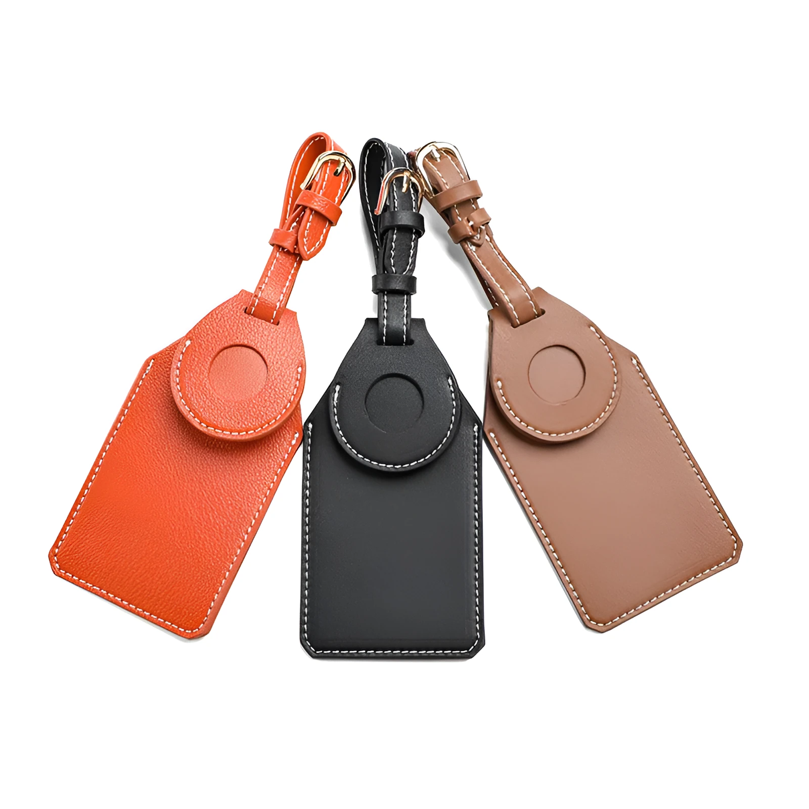 Black, brown, and orange PU/PVC protective cases for a luggage tag location tracker.