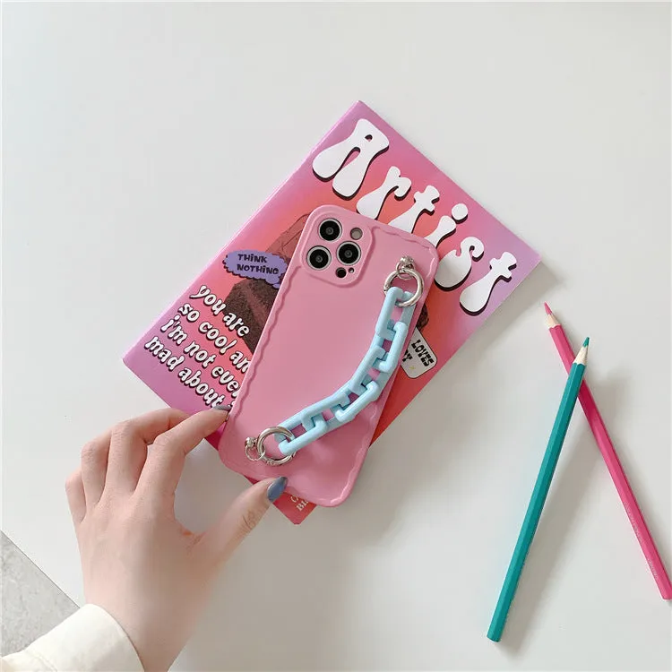 Colourful candy pink and light blue iPhone case with a chain attached to the side.