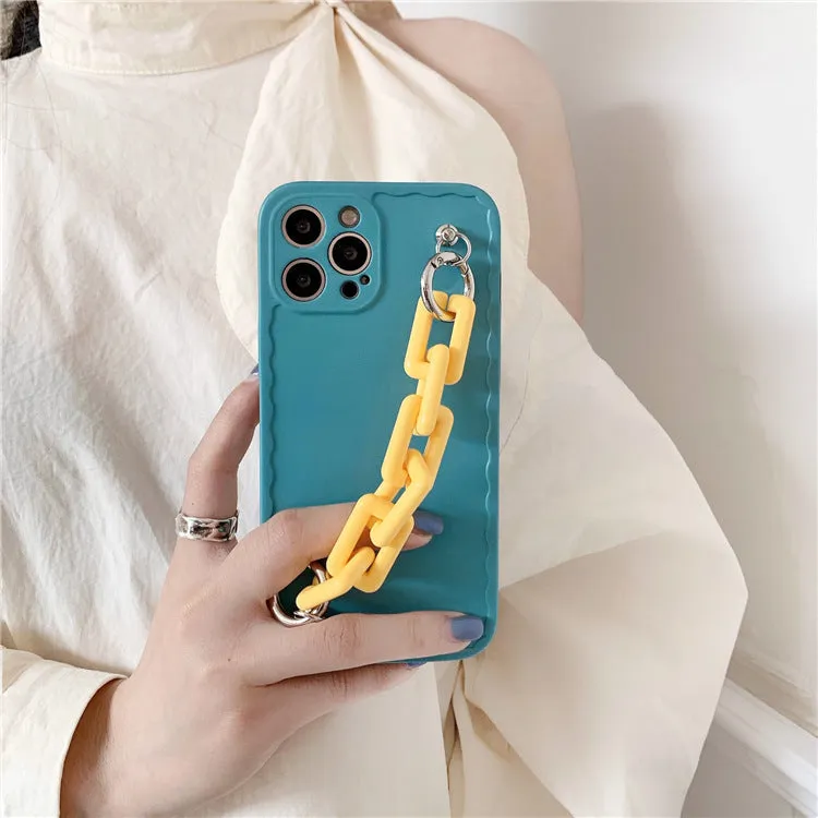 Colourful candy pink and light blue iPhone case with a chain attached to the side.