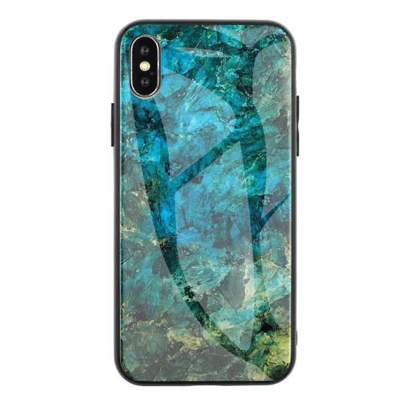 Clear marbled glass design Huawei phone case with cartoon pattern on a table.