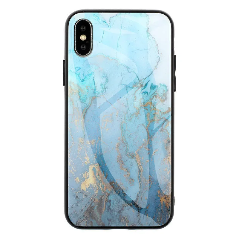 Clear marbled glass design Huawei phone case with cartoon pattern on a table.