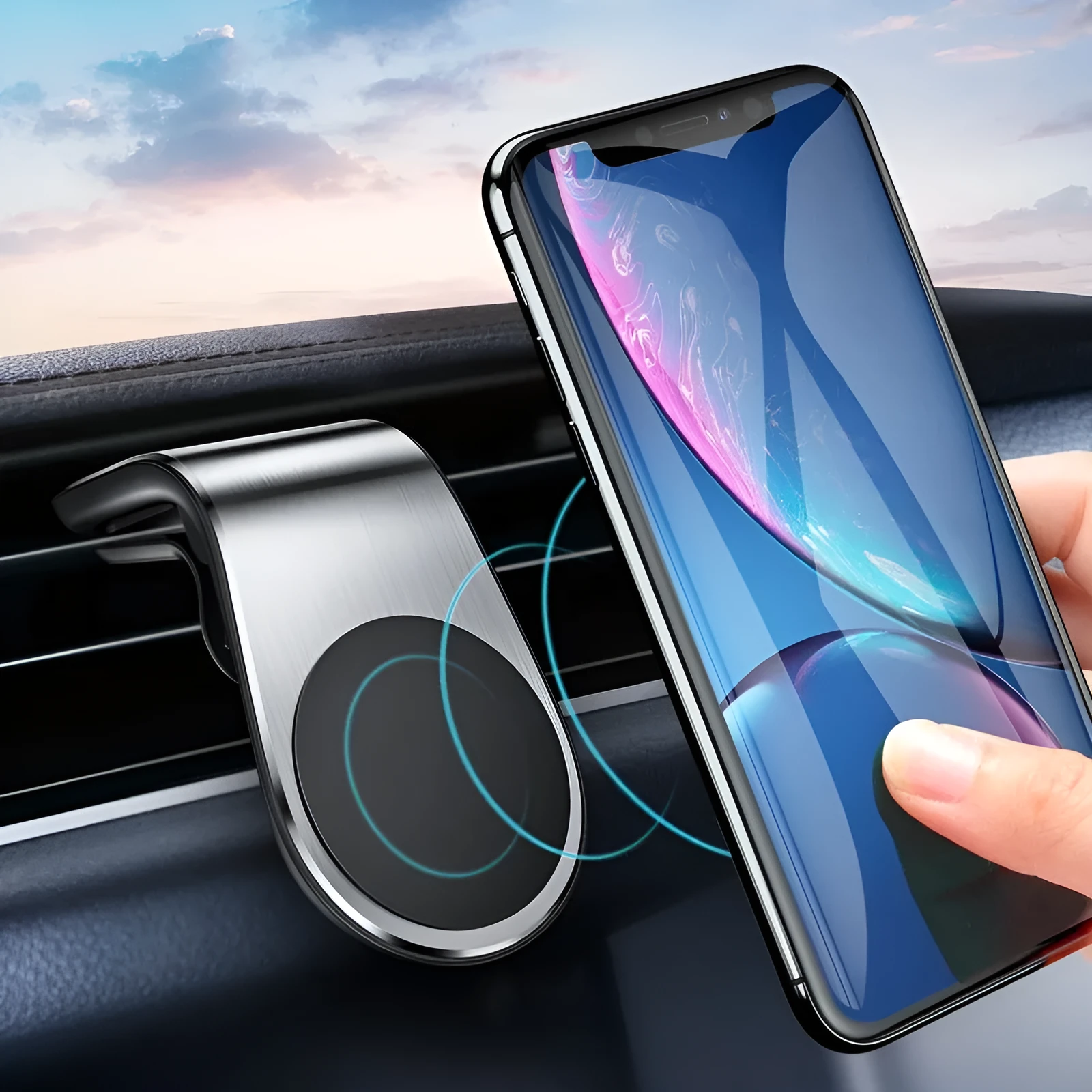 Black universal car phone holder bracket mounted on a car dashboard holding a smartphone.
