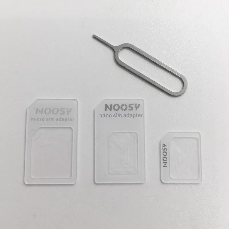 SIM Restore four-in-one adapter kit showing three plastic SIM converters and a metal ejector pin.