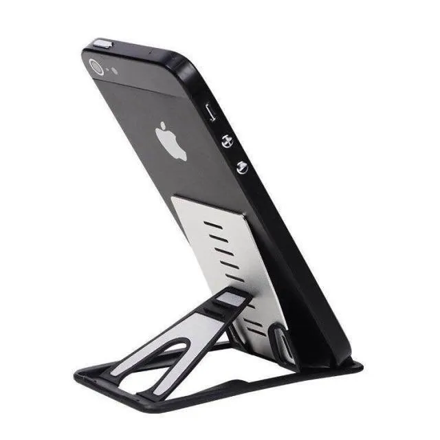Black card phone holder measuring 8.5cm by 5cm on desktop surface