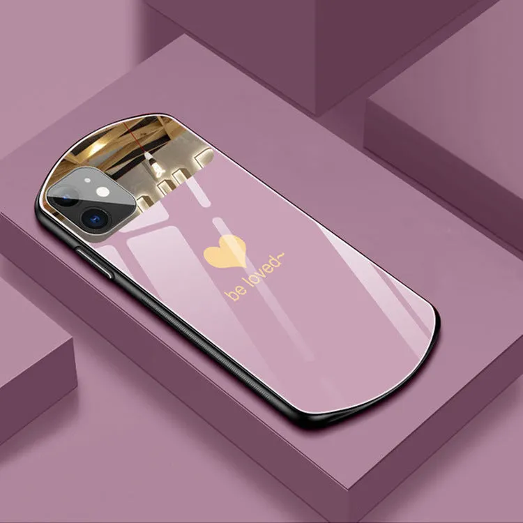Black phone case for iPhone with a rectangular mirror on the back and letter graphic design.