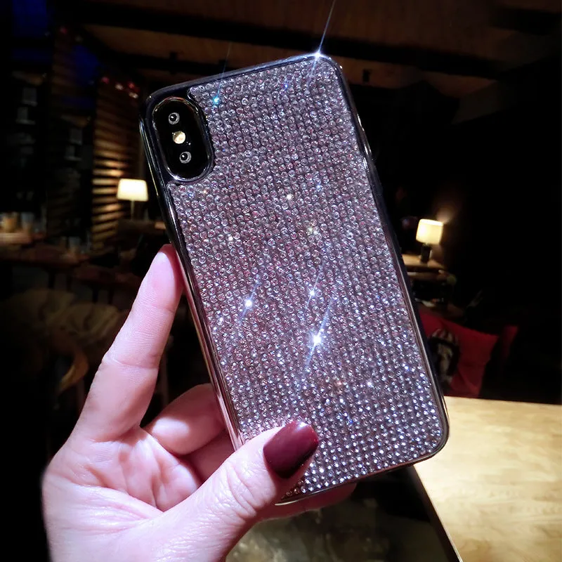 Silver silicone diamond-encrusted phone case for various iPhone models.