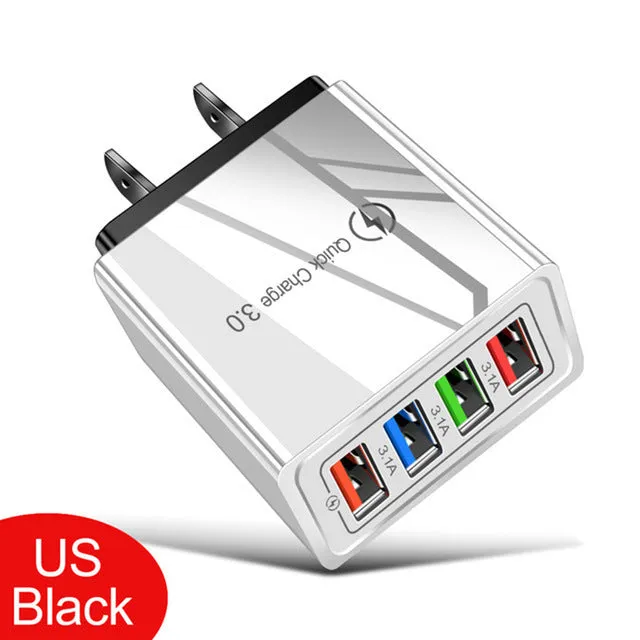 Four-port USB wall charger with UK three-pin plug in black and white colour scheme
