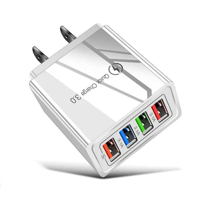 Four-port USB wall charger with UK three-pin plug in black and white colour scheme