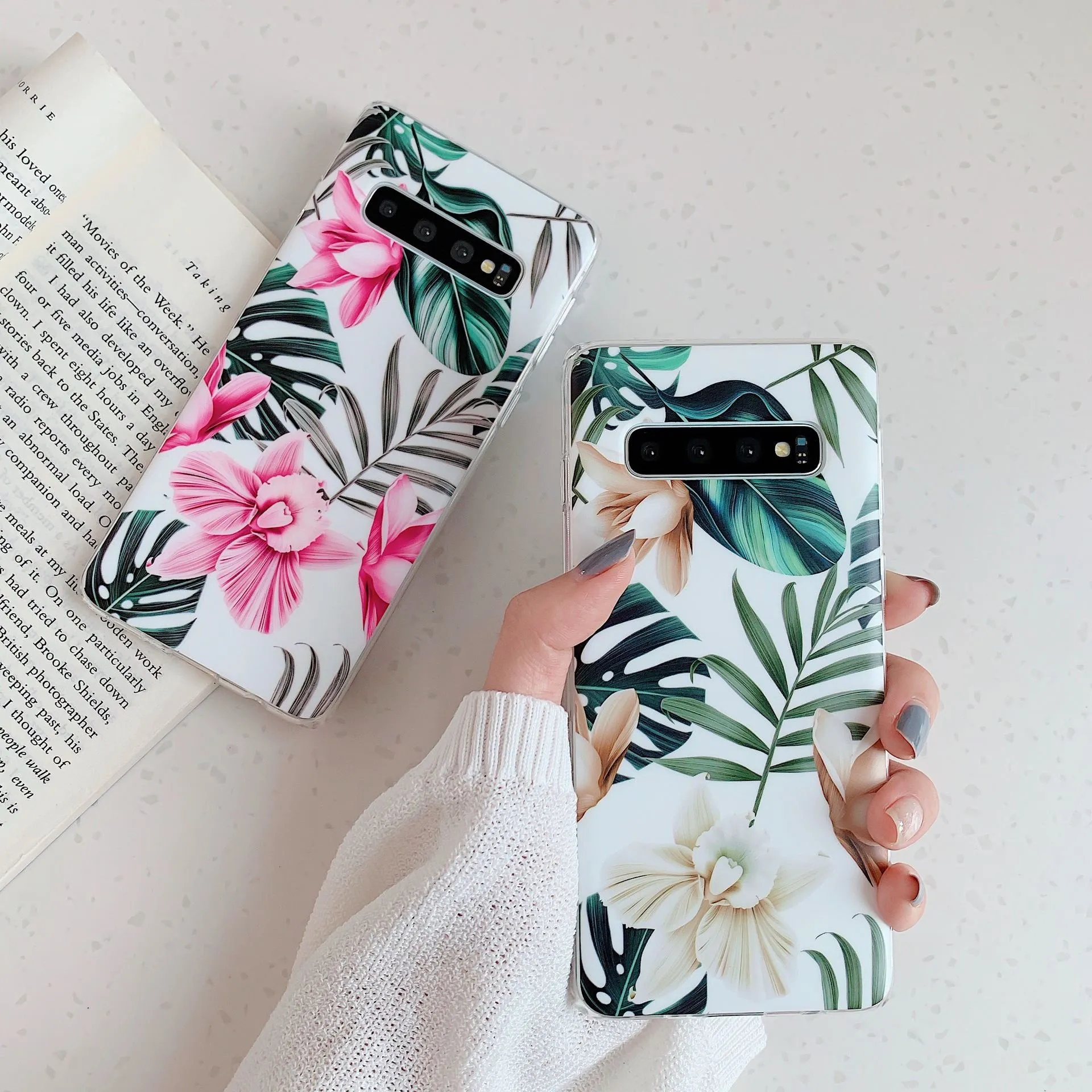 Samsung Galaxy phone case with green leaf flower design on TPU material.